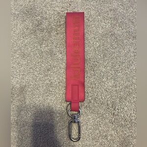 lululemon never lost keychain in pink and coral